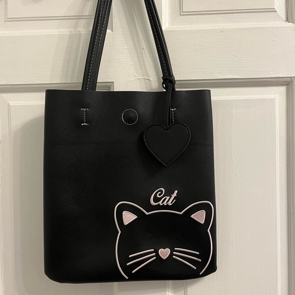 black leather cat tote bag